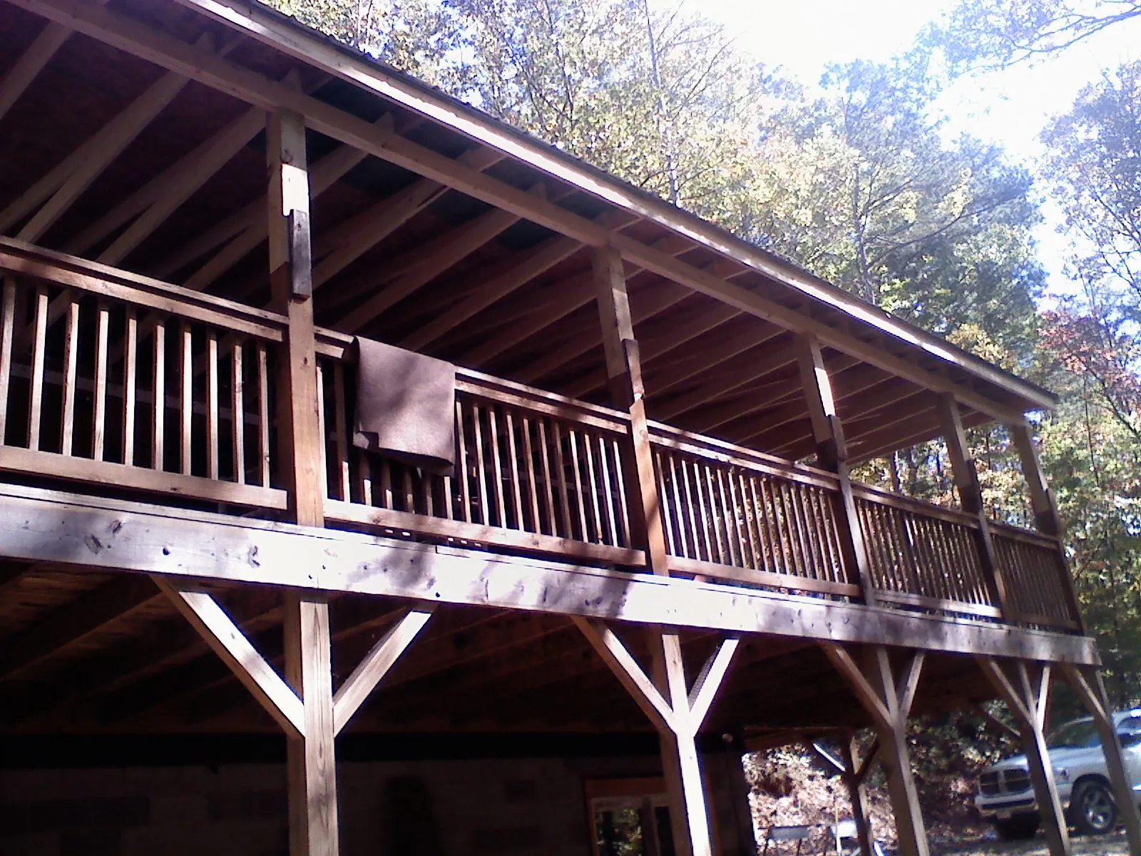Timber framing under a new elevated porch and deck — Roof Leak Repair in Marcola by Roofing Brothers